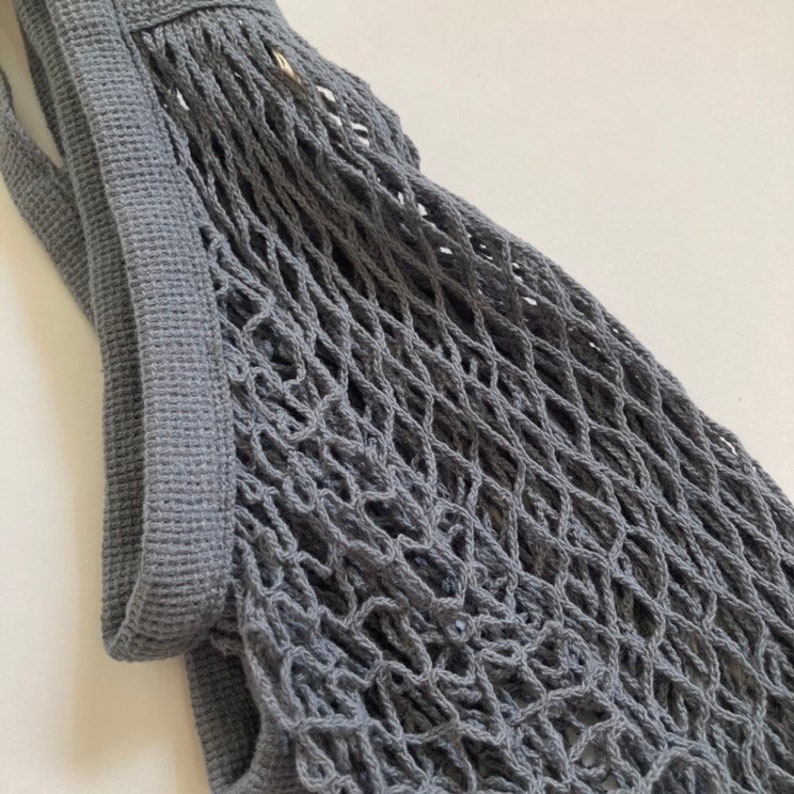 close up image of gray mesh bag showing the side and netting