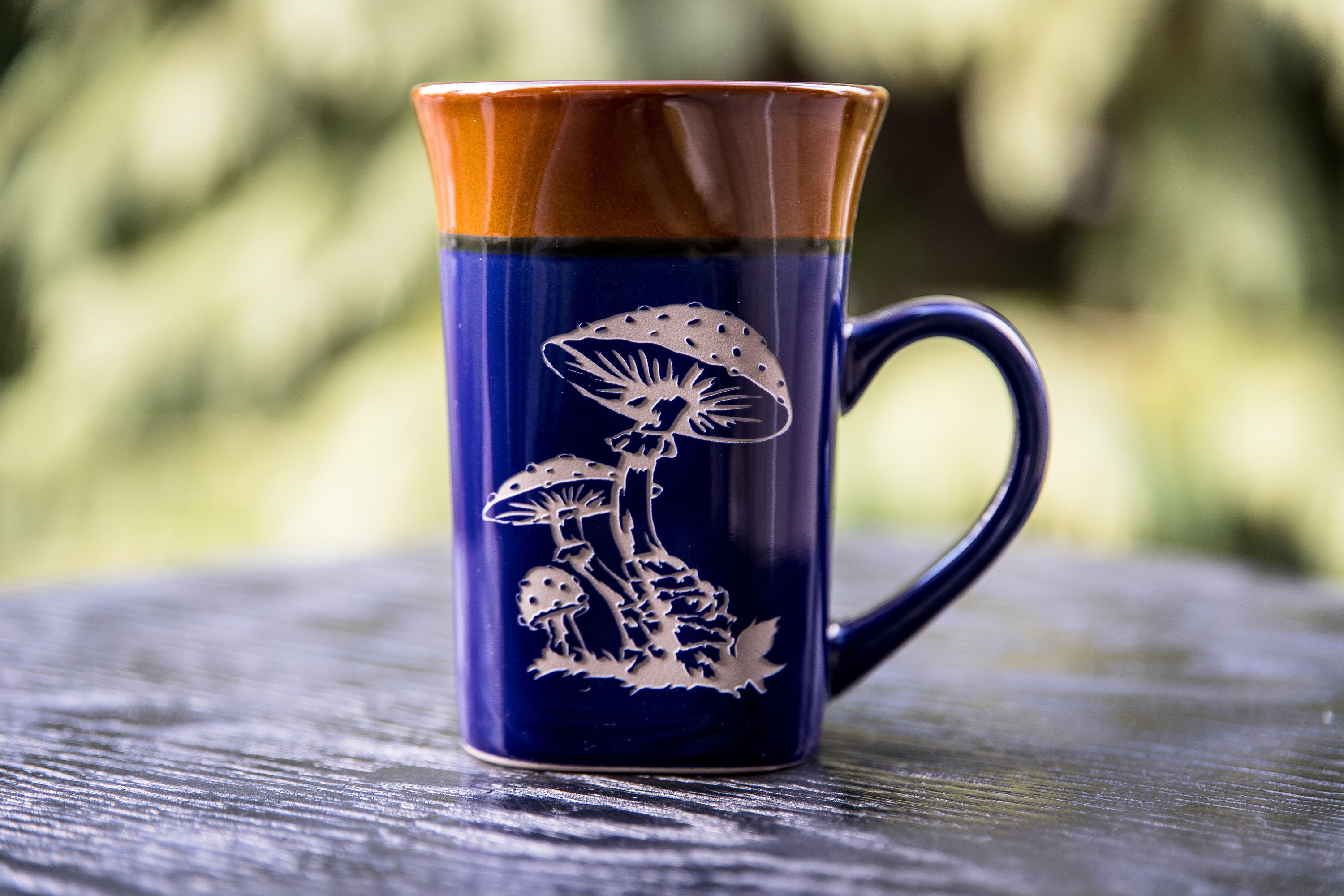 Handmade Sand Carving Done By Set In Stone USA Mushroom Coffee mug or Tea cup Deep Carved Engraved Square Two-Tone Flared-Rim Stoneware Mug The mug is manufactured by Royal Norfolk 14 oz