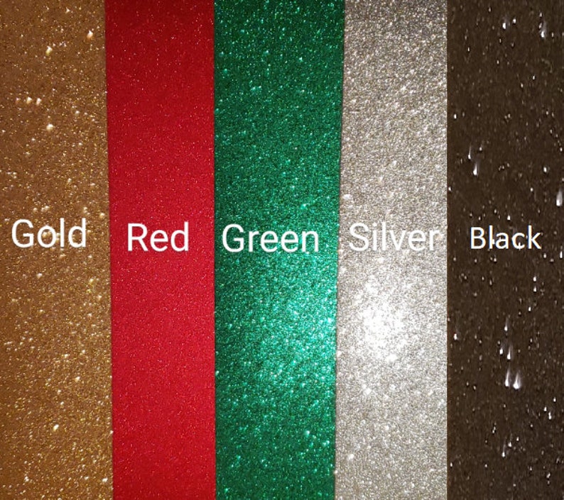 May include: Five vertical strips of glitter paper in gold, red, green, silver, and black.