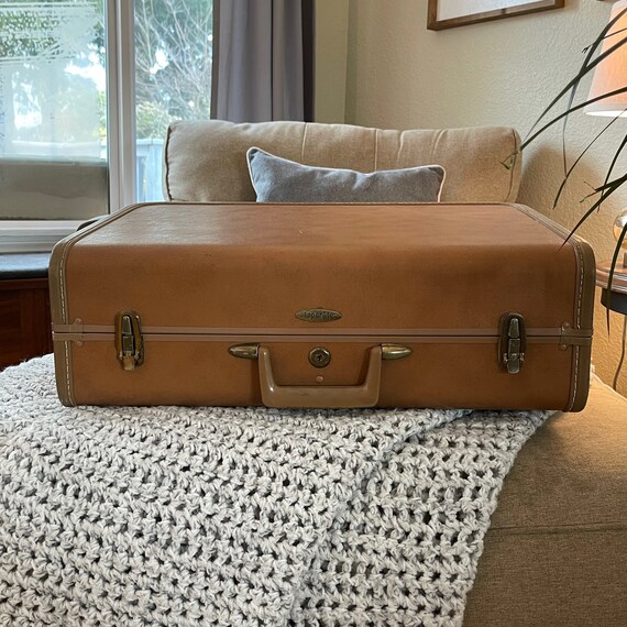 taperlite vintage luggage