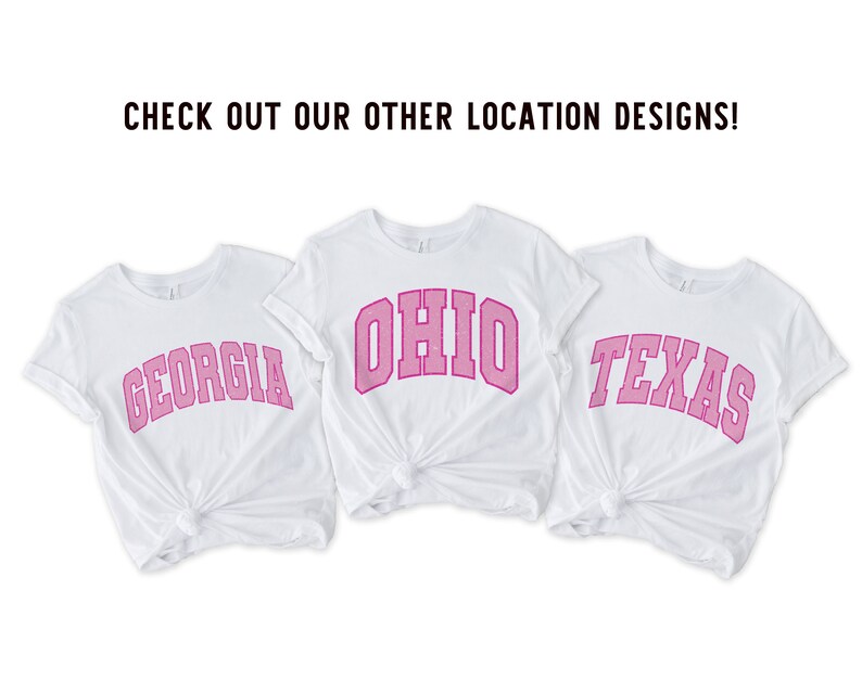 May include: Three white t-shirts with pink text. The shirts say "Georgia", "Ohio", and "Texas".