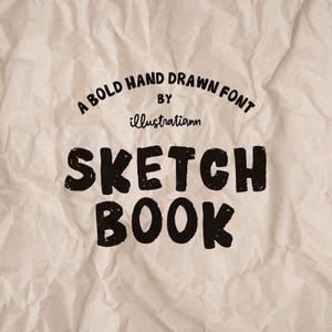 May include: A bold, hand-drawn font titled "Sketch Book" is displayed on a textured, beige paper background. The text is in a thick, black, brush-stroke style, with the word "Sketch" above "Book". The font is by illustratiann.