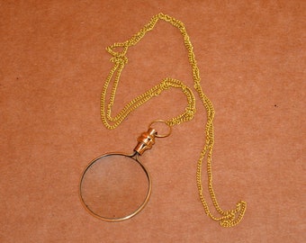 Antique vintage brass necklace locket magnifying glass magnifier collectible