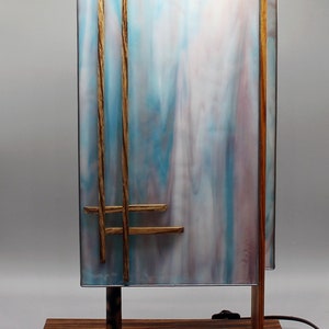 Add a touch of Frank Lloyd Wright to your home or office with our tall Arizona Mission Lamp.
