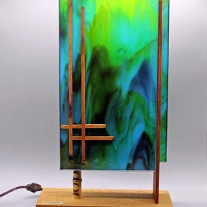 Add a touch of Frank Lloyd Wright to your home or office with our tall Arizona Mission Lamp.