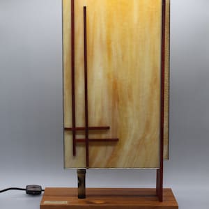 Add a touch of Frank Lloyd Wright to your home or office with our tall Arizona Mission Lamp.