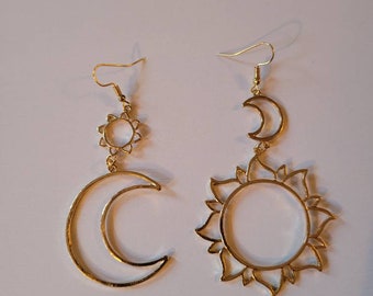Gorgeous gold line art minimalist sun and moon earrings!
