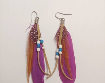 Beautiful multi colored white, brown, blue, pink, purple beaded and feather earrings!