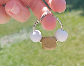 Beautiful silver hoop earrings with natural wood beads