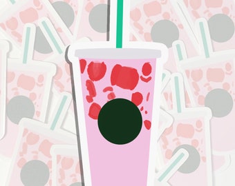May include: A pink and red patterned sticker of a plastic cup with a black lid and a straw. The cup is filled with a pink and red liquid.