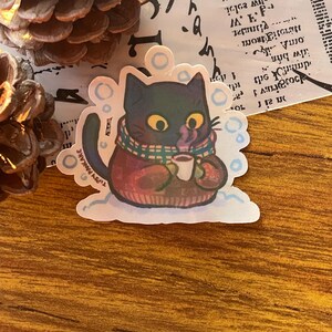 Gatto invernale con cioccolata calda - Grazioso adesivo impermeabile per laptop, Kindle, diario, album da disegno e molto altro!
