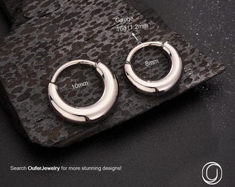 May include: Two polished titanium hoop earrings. One earring is 10mm in diameter, the other is 8mm. The gauge is 16g/1.2mm. The word "TITANIUM" is at the top. The text "Search OuferJewelry for more stunning designs!" is at the bottom.