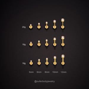 May include: A set of 18 gold body jewelry pieces with clear gemstones. The jewelry is arranged in three rows, with each row representing a different gauge: 20g, 18g, and 16g. Each row has five pieces, with the gemstones increasing in size from 5mm to 12mm. The text "@ouferbodyjewelry" is at the bottom of the image.