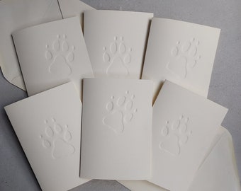 Lot de 6 cartes ivoire avec empreintes de pattes de chien estampées, vierges à l'intérieur. Vendeur britannique. Cadeau pour amoureux des animaux fait main perte naissance bébé chiot nouvelles mères
