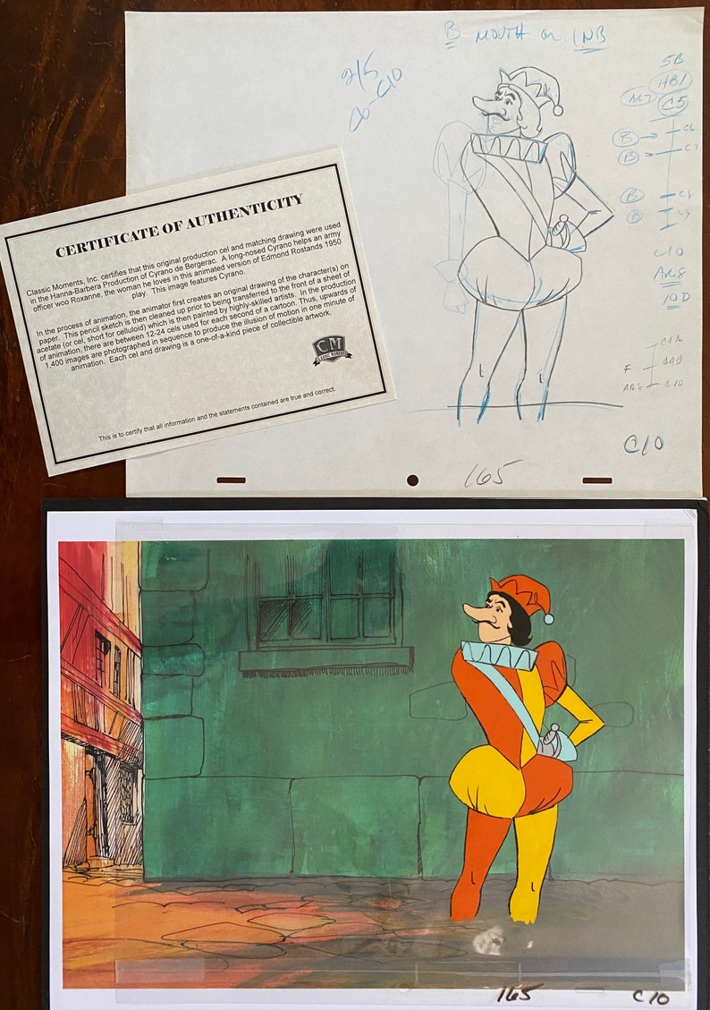 May include: An original production cel from the Hanna-Barbera animated version of Cyrano de Bergerac. The image features a colorful cartoon character with a long nose, wearing a red and yellow outfit. Includes a certificate of authenticity.