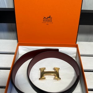 Ceinture Hermès CONSTANCE réversible en cuir noir grainé/rouge lisse, F 70 R, RUPTURE DE STOCK, Taille XS/Small, 1100