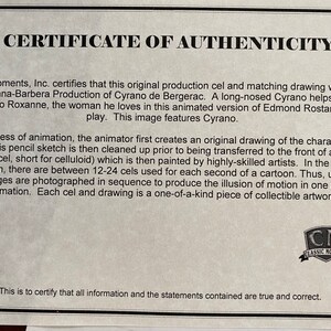 May include: A certificate of authenticity from Classic Moments, Inc. for a production cel and drawing from the Hanna-Barbera animated version of Cyrano de Bergerac. The text describes the animation process and the artwork's collectible nature.