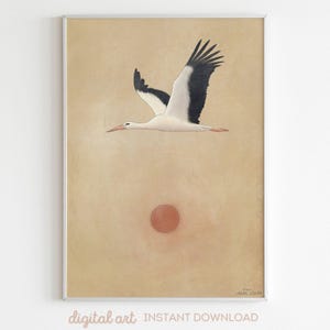 May include: A framed digital art print featuring a stork in flight against a beige background with a red circle. The stork is white with black wingtips. The words "digital art INSTANT DOWNLOAD" are at the bottom.