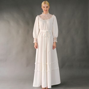 Vintage 1970s white boho wedding dress, a-line, high lace neck, lace stitched on the skirt, lace at the end of the sleeves M-XL image 1
