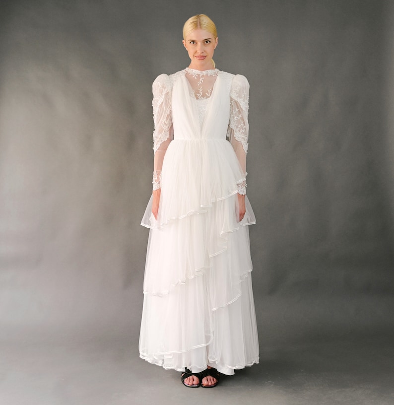Vintage 80s white tulle wedding dress with asymmetric ruffle, sheath silhouette, long sleeves with lace details and embroidered pearls Small image 1