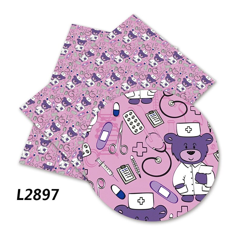 May include: Pink and purple patterned fabric with a repeating design of teddy bears dressed as doctors. The fabric features medical symbols like a stethoscope, bandages, pills, and a thermometer. The fabric is labeled with the number L2897.