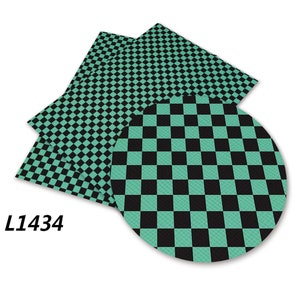 Puede incluir: Hojas de tela a cuadros verdes y negros. La tela tiene una textura sutil. La imagen incluye el texto "L1434".
