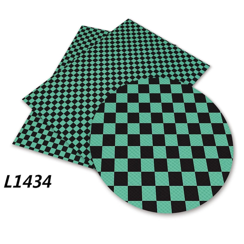 Puede incluir: Hojas de tela a cuadros verdes y negros. La tela tiene una textura sutil. La imagen incluye el texto "L1434".
