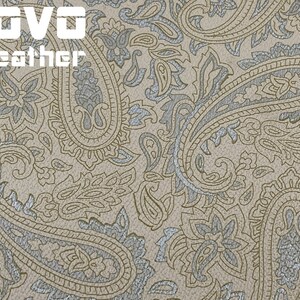 May include: A beige fabric with a silver paisley pattern. The fabric has the text "VOVO leather" printed on it.