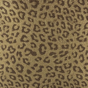May include: Gold fabric with a brown leopard print pattern.