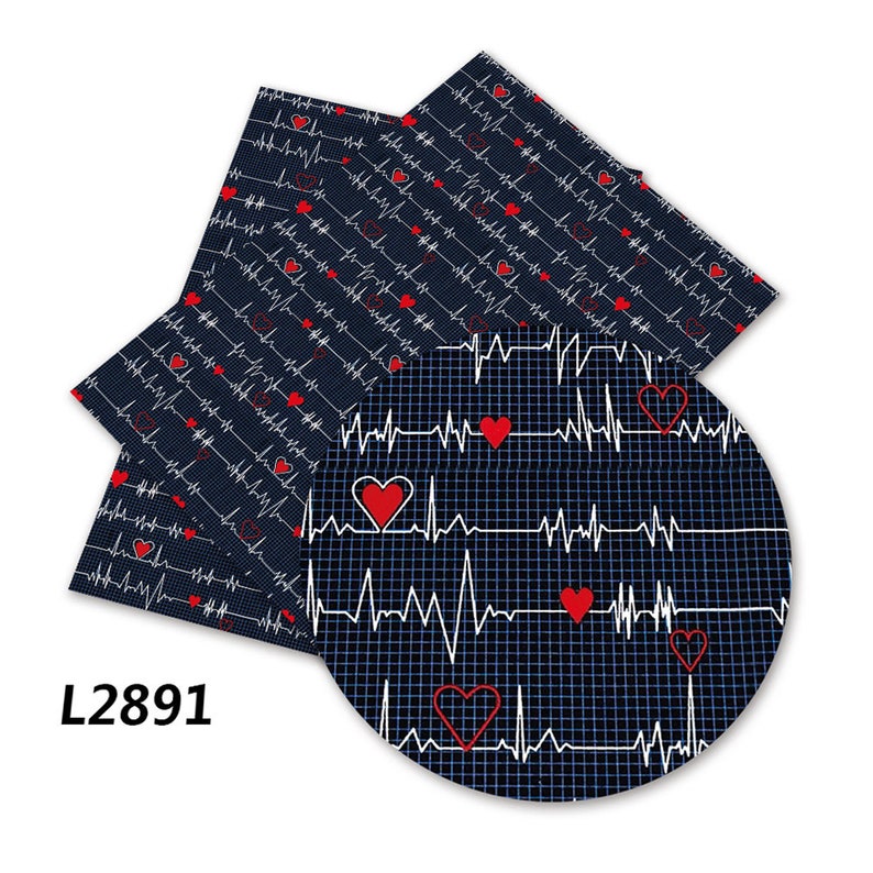 May include: A sheet of blue and white patterned fabric with red hearts and EKG lines. The fabric has the text "L2891" printed on it.