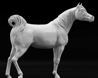 May include: A white ceramic sculpture of a horse standing on a black surface. The horse has a long flowing mane and tail.