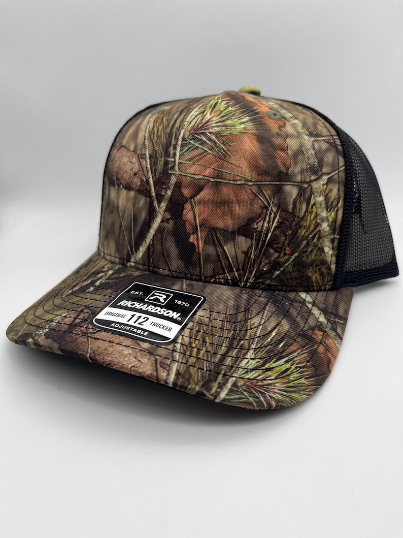 Boné de malha com fecho de pressão Any State Snow Camo ou Mossy Oak Country DNA Coyote Hunter MossyOak Country DNA