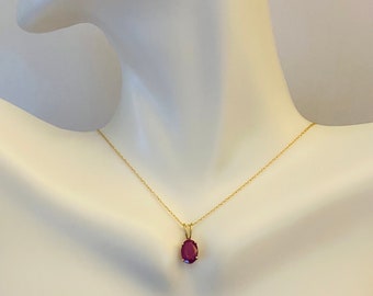 14 Karat Yellow Gold Genuine 7 x 5mm Oval Ruby Pendant (Available with or without chain)