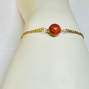 10 Karat Yellow Gold Curb Link Bracelet with 9mm Brown Goldstone Venturina Bead