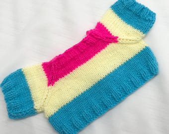 Hand knitted Pride flag jumpers in various colours to fit  a 15” to 18” bear.