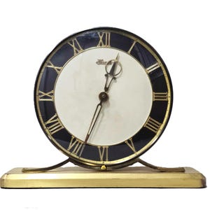 Vintage Hermle Brass Mechanical Mantel Clock Mid Century German Timepiece with Keyless Wind Up System and Classic Roman Numerals