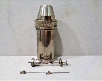 ヴィンテージの古いガラスと金属の注射器 5ml 古い容器入り 滅菌器 + 