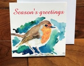 Christmas robin greeting card designed by British artist