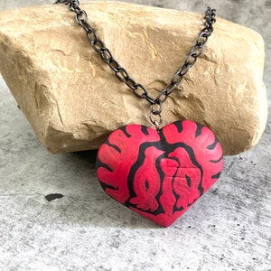Long Gunmetal finished Necklace feat. Copal Wood Heart