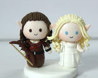 Fantasy wedding cake topper theme Movie inspired renaissance bride & groom