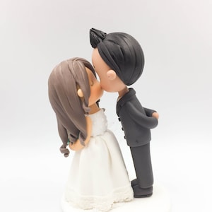 Classic wedding cake topper, long wavy bridal hairstyle bride and spiky hairstyle groom clay figurine, wedding anniversary cake topper