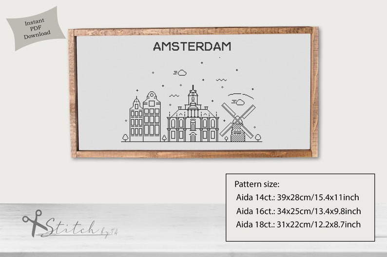 May include: A black and white line drawing of the Amsterdam skyline, including a windmill, buildings, and a cloud. The text "AMSTERDAM" is at the top of the image. The pattern size is listed below the image: Aida 14ct.: 39x28cm/15.4x11inch, Aida 16ct.: 34x25cm/13.4x9.8inch, Aida 18ct.: 31x22cm/12.2x8.7inch.