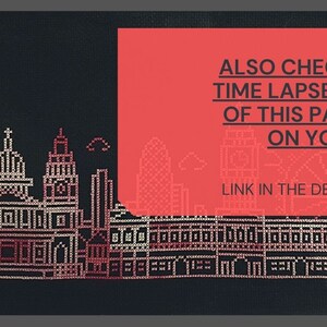 May include: A cross-stitch pattern of a city skyline with buildings and a church. The text "ALSO CHECK OUT TIME LAPSE VIDEO OF THIS PATTERN ON YOUTUBE LINK IN THE DESCRIPTION" is on a red background.