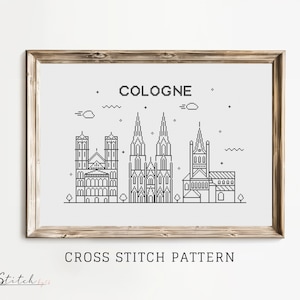 Könnte beinhalten: Schwarz-weißes Linienkunst-Kreuzstichmuster der Kölner Dom in Deutschland. Das Muster enthält den Text "COLOGNE" oben und "CROSS STITCH PATTERN" unten.