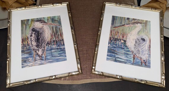 Pair of Matted Canvas Paper Heron Prints Framed in Silver/Champagne Finish Bamboo Frames