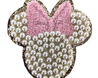 Parche de Minnie color marfil perlado, lienzo bordado, adhesivo termoadhesivo.