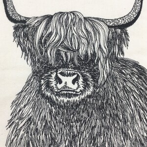 May include: Black and white line drawing of a Highland cow with long, shaggy hair. The cow is looking directly at the viewer.
