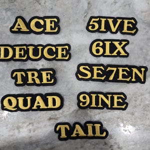 5ive, 6ix, Se7en, 9ine, iron-on embroidered 3&quot; X 1&quot; patch (black and old gold)