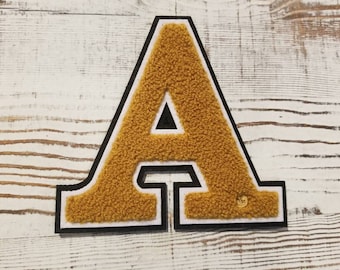 Small letter A- (4.5") chenille; old gold and black; Fraternity, Sorority; Alpha