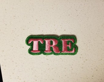 TRE Aufnäher, gestickt, 2.5/8" X 1" (pink/grün)